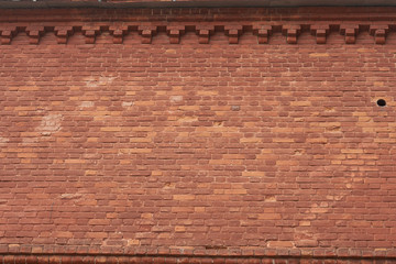 red brick wall texture grunge background with vignetted corners,