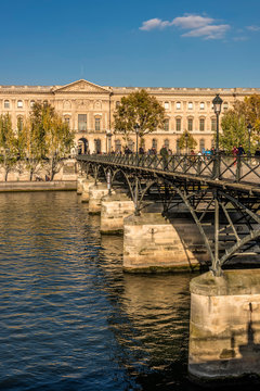 France, Paris, 1st arrondissement, The Louvre at the Quai Francois Mitterrand and the Pont des Arts on the Seine river