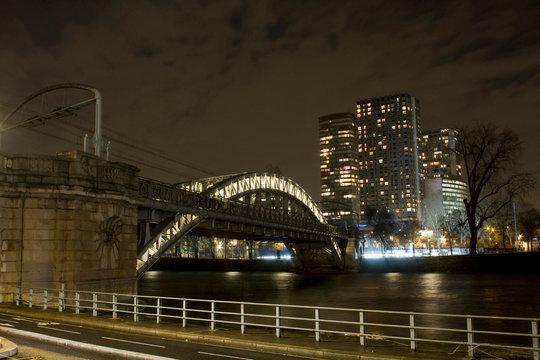 France, Paris, 16th arrondissement, viaduct of the RER seen from the Voie George Pompidou, by night in winter.