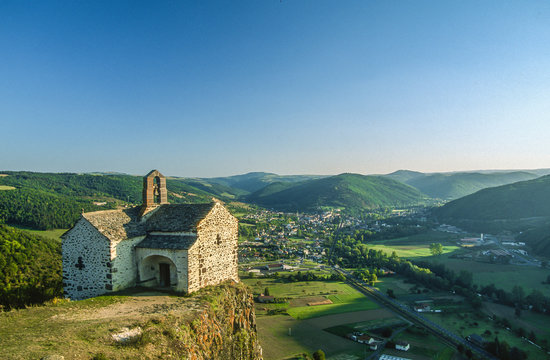 France, Auvergne, Cantal, chapel Sainte-Madeleine on a rocky outcrop over La Vallee de l'Alagnon at Massiac