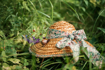 straw hat laying on the grass