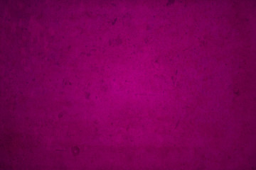 Violet dark edged grunge background overlaid with grungy elements.