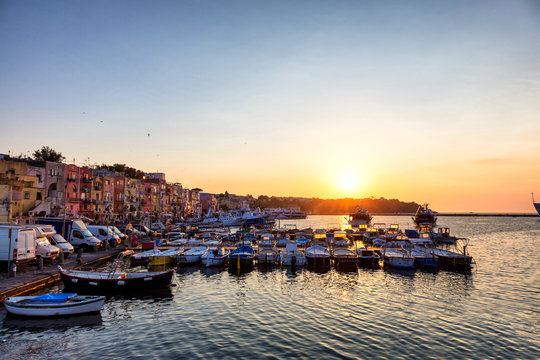 Sunset in the port of Procida, Gulf of Naples, Campania region, Italy