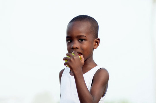 child eats an apple as it is nutritious.