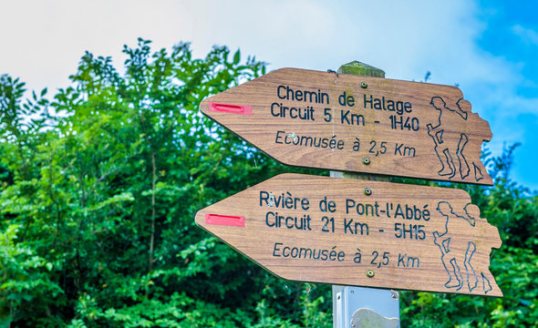 France, Brittany, Pont l'Abbe, signposts indicating the hiking paths