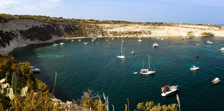 Bay panorama with a lot of yachts near St. Peter's Pool beach Marsaxlokk, Malta