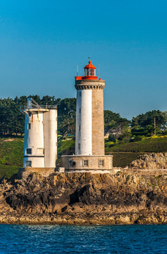 France, Brittany, Goulet de Brest, Plouzane, Petit Minou lighthouse (1848) and old radar tower of the semaphore of the national navy (military field)