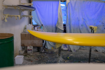 Painted surfboard in workshop