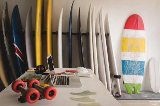Surfboards in a shop - Powered by Adobe