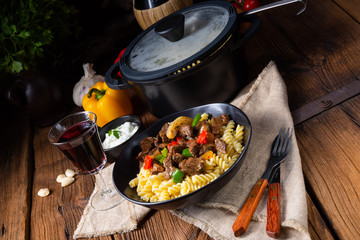 Fussili noodle with klaschise spicy goulash and paprika