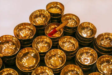 Traditional singing bowls in Indian shop