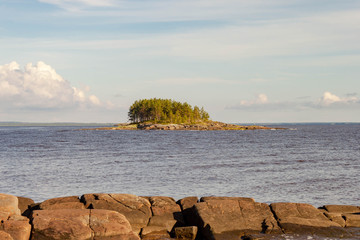 Sea trip by motor boat to rocky Kiy island by White Sea of Russia, Onega city, Arkhangelsk region