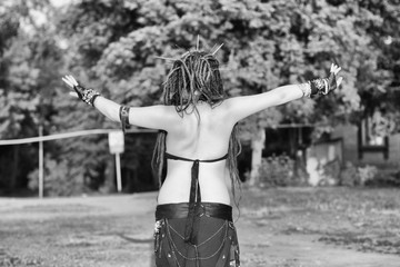 young woman dancing tribal