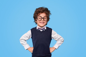 Cheerful excellent pupil looking at camera