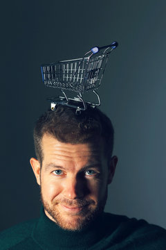 Man with kart on his head