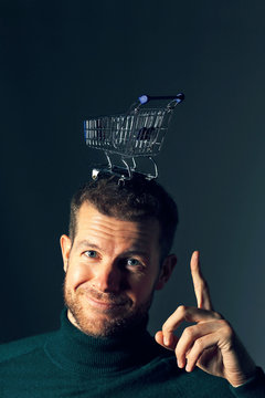 Man with kart on his head