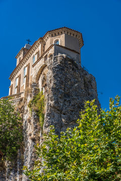 France, Drome, The Provencal Baronnies Regional Natural Park, Pierrelongue, rocky peak restructured in the 19th century to recieve the church Notre Dame de la Consolation