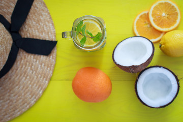 tropical fruits on a yellow board top view