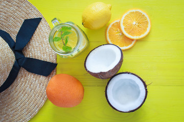 tropical fruits on a yellow board top view