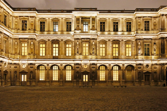 Paris. 1st district. Louvre Museum by night. Square courtyard. Facade of the pavilion Saint Germain l'Auxerrois.