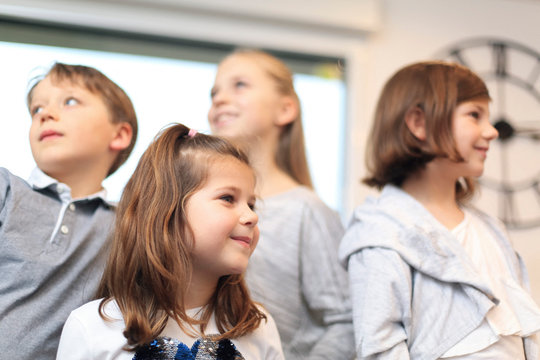 Children looking in different directions