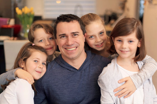 Single father and his children.