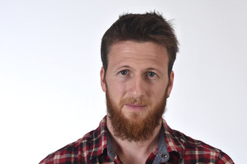 Obraz premium portrait of a man in plaid shirt on white background