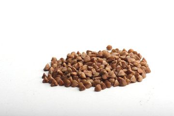 a pile of buckwheat isolated on white background