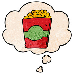 cartoon popcorn and thought bubble in grunge texture pattern style