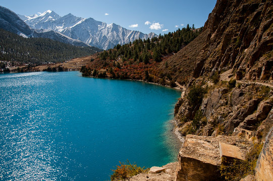 The path bordering the Phoksundo lake, Dolpo, Nepal