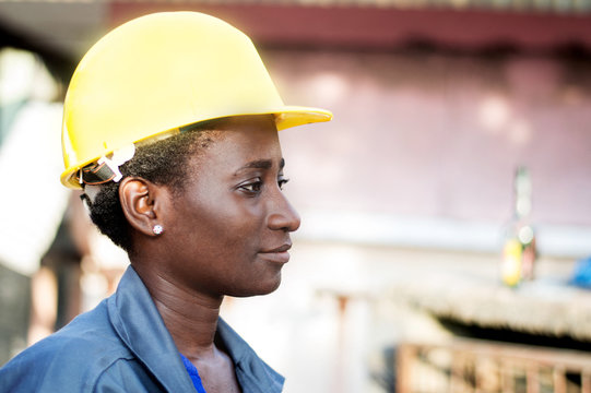 Portrait of a young worker in her workplace.