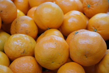orange pile. Orange is a fresh tropical fruit