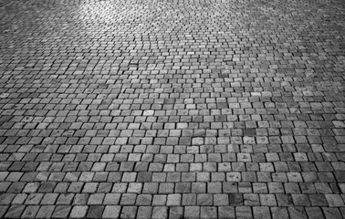 Stone blocks made of stone. City pavement paved with stone pavement.
