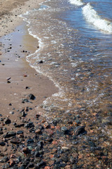wave hitting empty shore, Finland