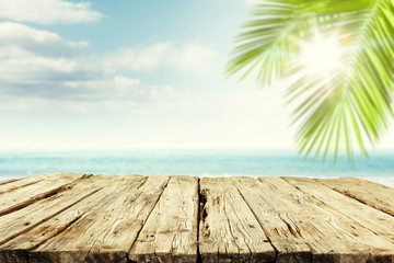 Fototapeta premium Desk of free space and summer time. Beach landscape and ocean. 
