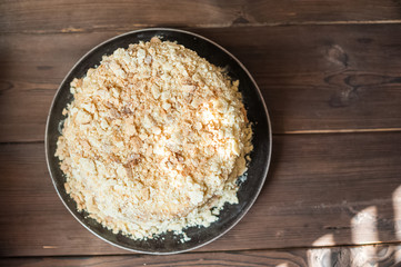 Slice Confectionery Napoleon Cake. Portion of Custard Cream Dessert copy space. Crumbs Around Plate. Bakery Tasty Sweet Dish Closeup