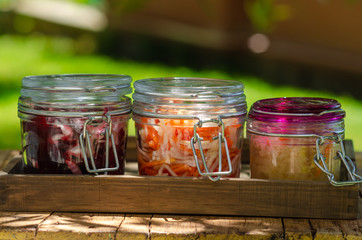Fototapeta na wymiar Traditional fermented foods - sauerkraut, kimchi with carrot, beet, brassica rapa for health and disease prevention. 