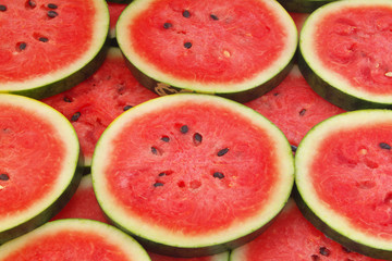 Many watermelon slices as background