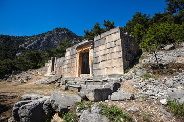 Fototapeta na wymiar Ancient Lycian City of Arykanda. Overview of the gymnasium complex. Arykanda is an ancient city built on mountain terraces at an altitude of 1000 meter. It is an amazing ancient city. Antalya-Turkey