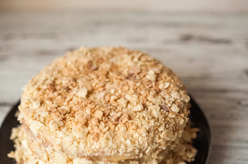Slice Confectionery Napoleon Cake. Portion of Custard Cream Dessert copy space. Crumbs Around Plate. Bakery Tasty Sweet Dish Closeup