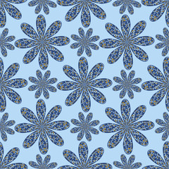 Seamless pattern with stylized flowers  pattern on the light blue background. Endless texture for design. Decorative seamless background for fabric, interior, cosmetics and textiles.