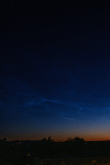 Naklejka premium noctilucent clouds at night