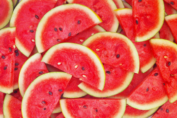 Sliced watermelon background © Valerii Evlakhov