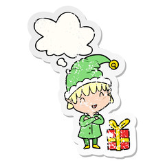 cartoon happy christmas elf and thought bubble as a distressed worn sticker