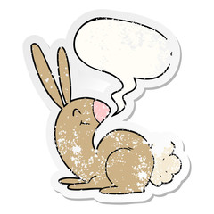cute cartoon rabbit and speech bubble distressed sticker