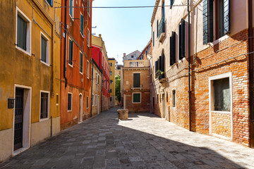 Fototapeta na wymiar Venice in Italy. Beautiful cozy street. Summer cityscape