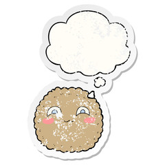 cartoon biscuit and thought bubble as a distressed worn sticker