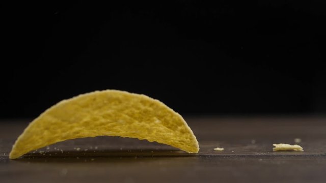 Chips falling onto a wooden surface