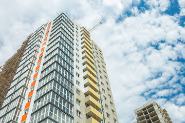 Fototapeta premium Facade of a multifamily house on blue sky backgrounds