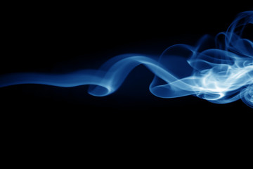Blue smoke abstract on black background, darkness concept